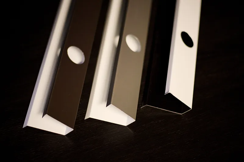 Invisible aluminum lighting tracks color-matched to home soffit.